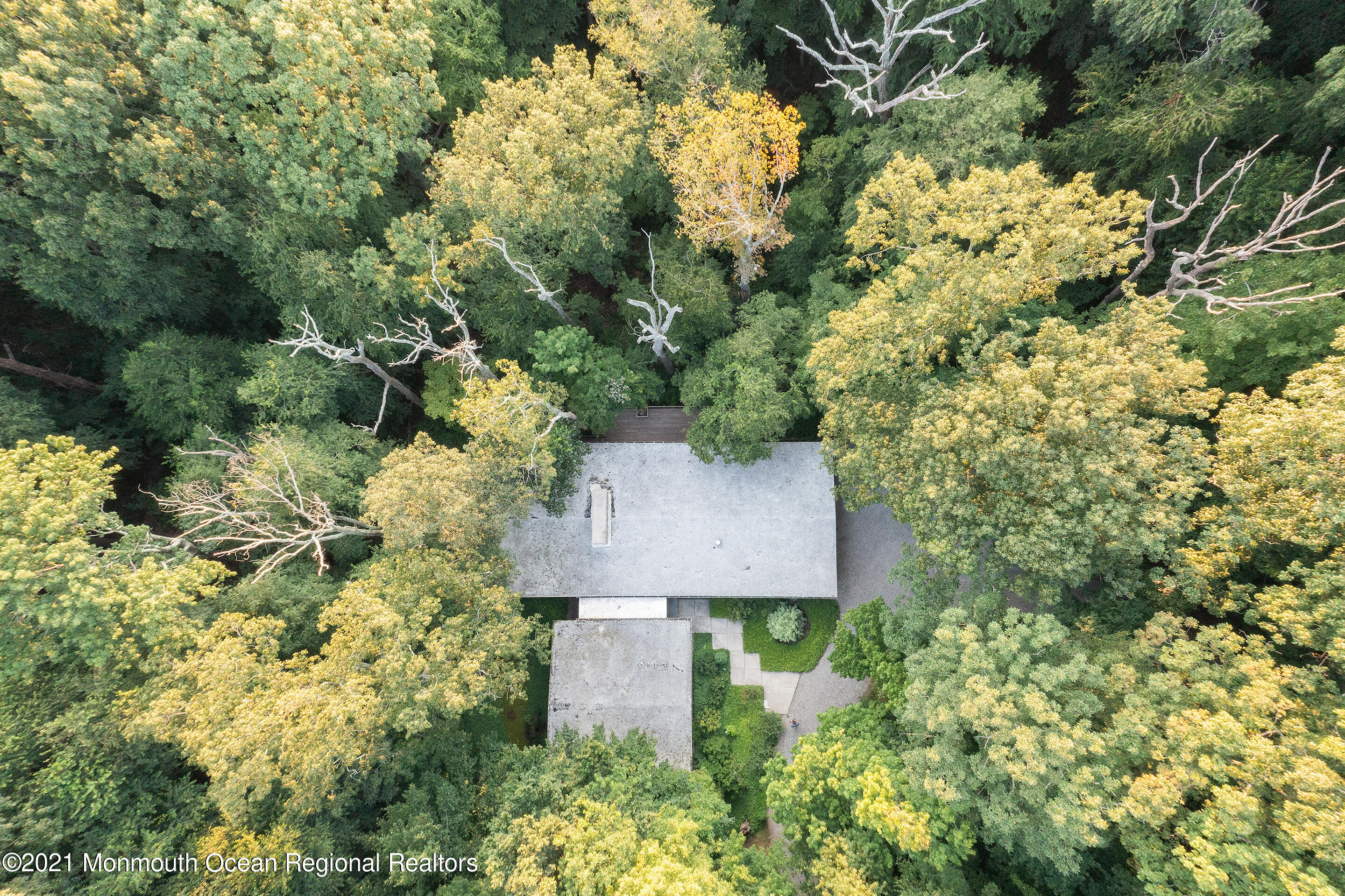277 Mc Clees Road Red Bank, NJ 07701 - Photo 44 of 53 an aerial view of a house with a yard and garden