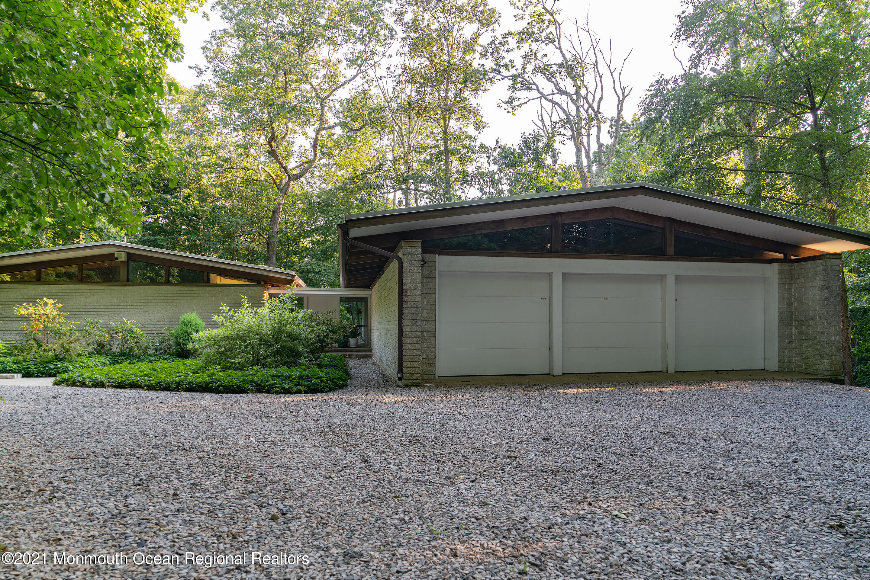 277 Mc Clees Road Red Bank, NJ 07701 - Photo 7 of 53 a front view of a house with a yard