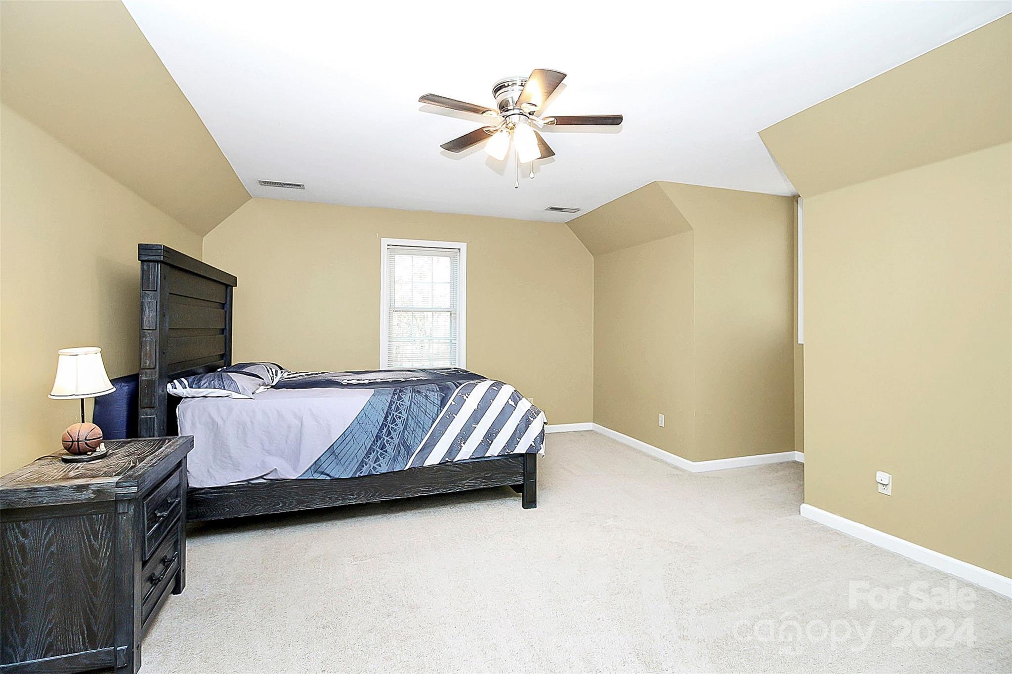 125 Vinson Road Rock Hill, SC 29730 - Photo 23 of 39 a living room with a couch and a flat screen tv