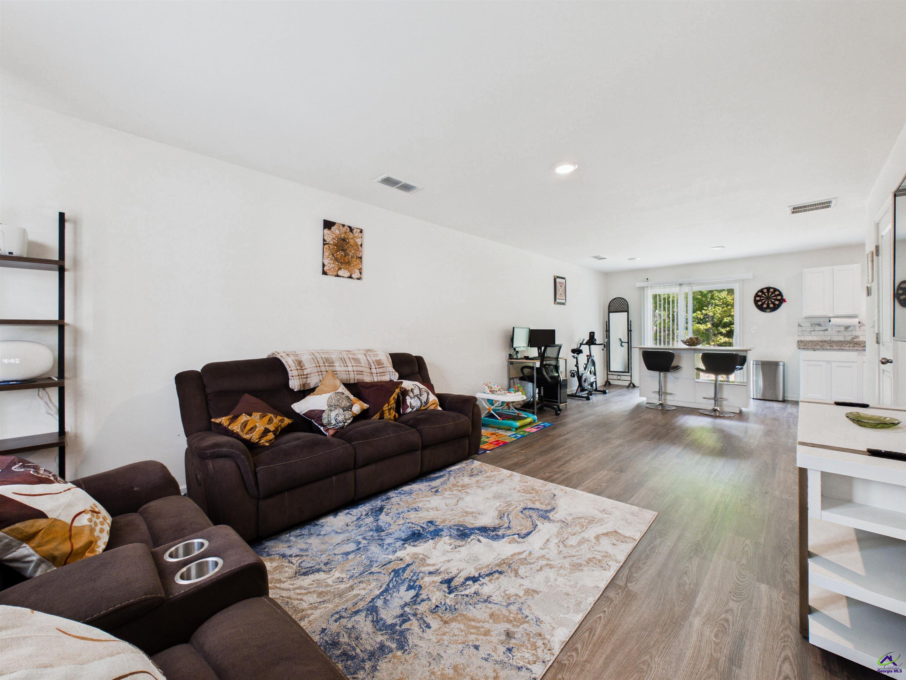 116 Jamie Court Fort Valley, GA 31030 - Photo 2 of 19 a living room with furniture and a wooden floor