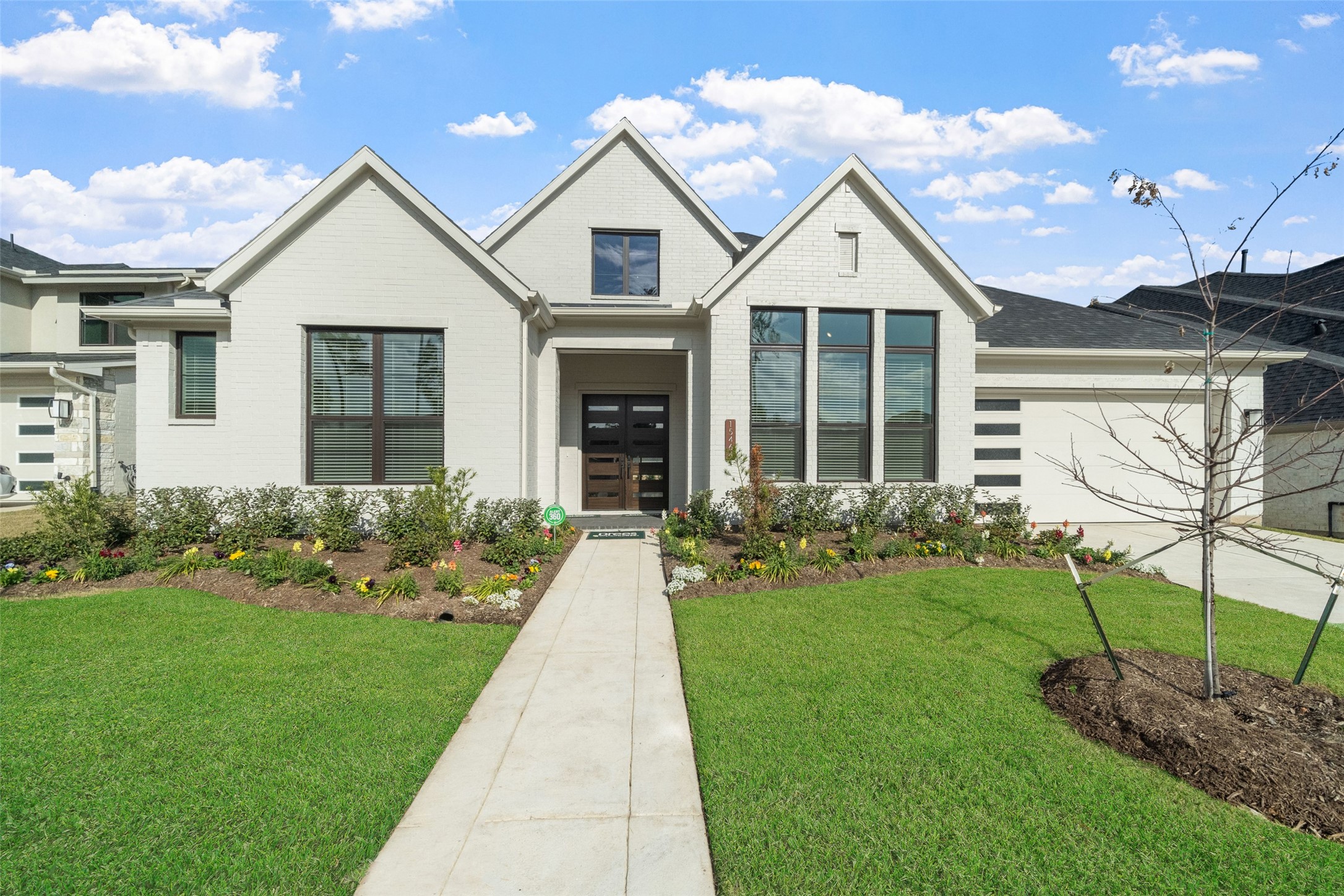 15464 Ringbill Way Magnolia, TX 77354 - Photo 1 of 37 a front view of a house with a yard and garage