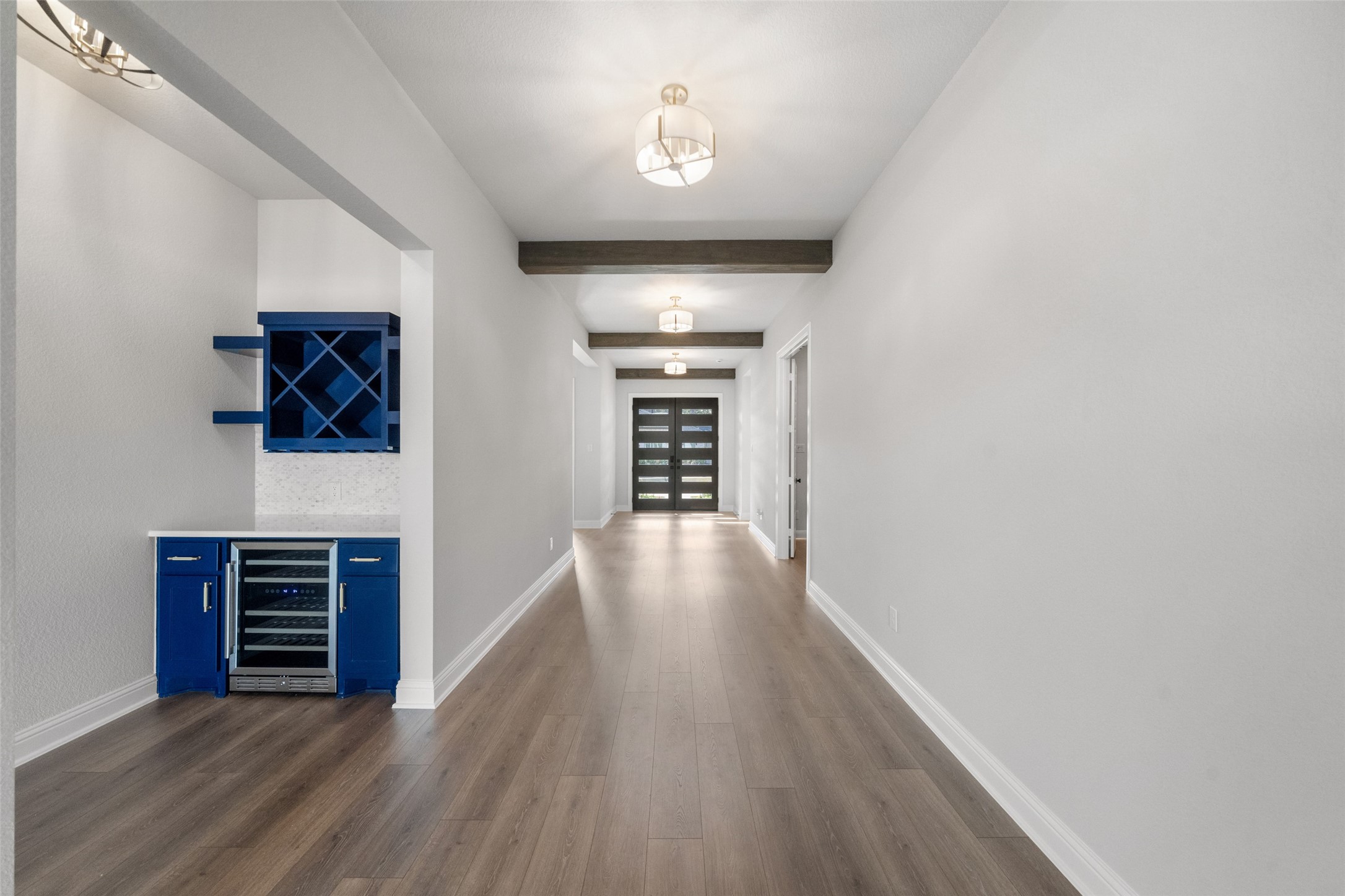 15464 Ringbill Way Magnolia, TX 77354 - Photo 11 of 37 wooden floor in an empty room with a fireplace