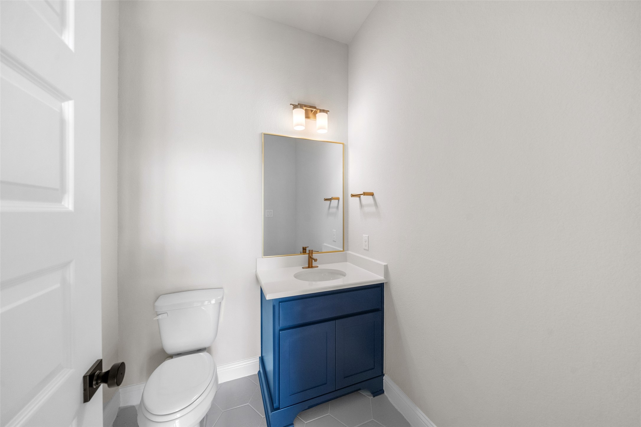 15464 Ringbill Way Magnolia, TX 77354 - Photo 21 of 37 a bathroom with a sink vanity mirror and toilet