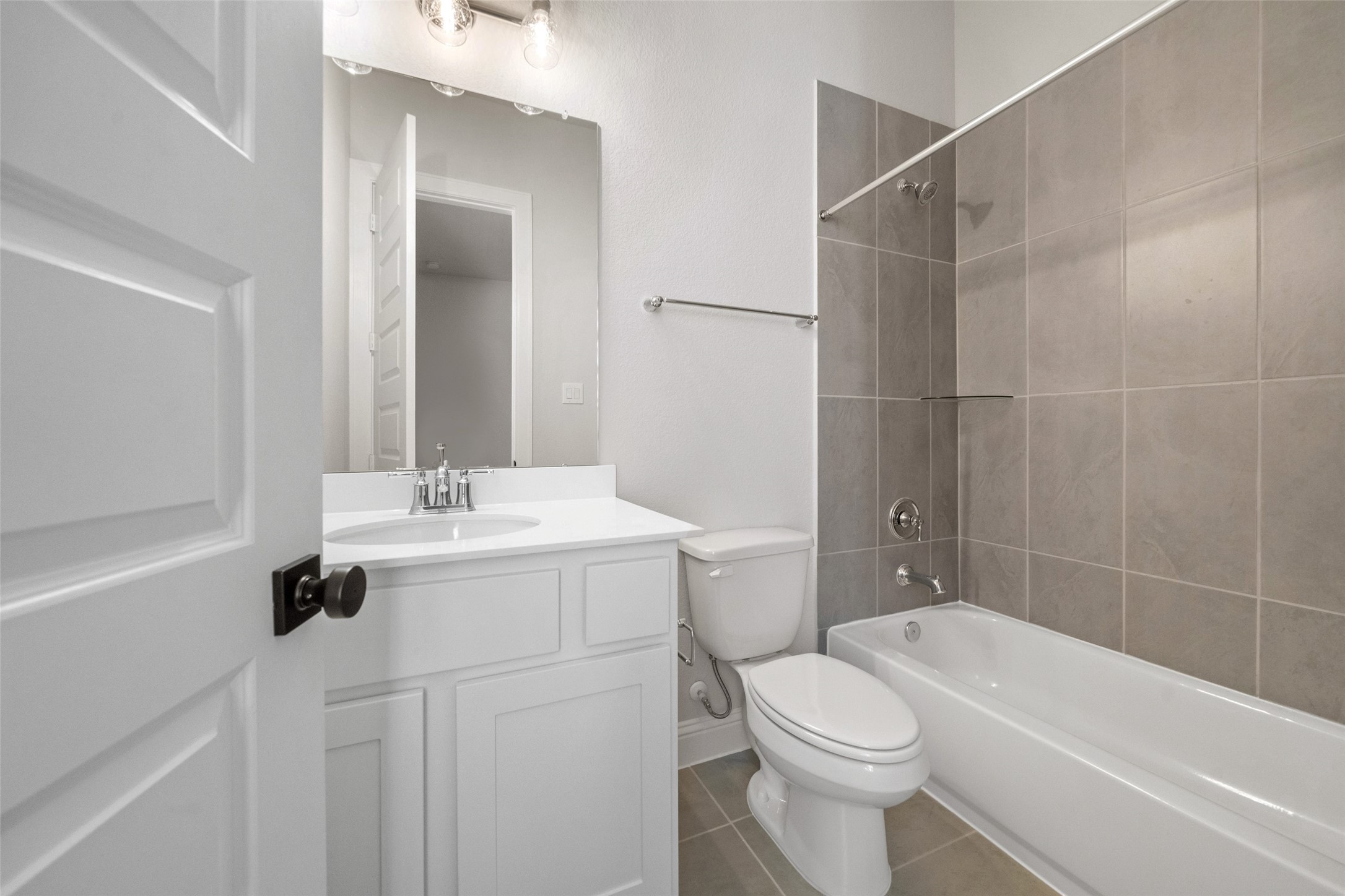 15464 Ringbill Way Magnolia, TX 77354 - Photo 27 of 37 a bathroom with a sink a toilet and a bathtub