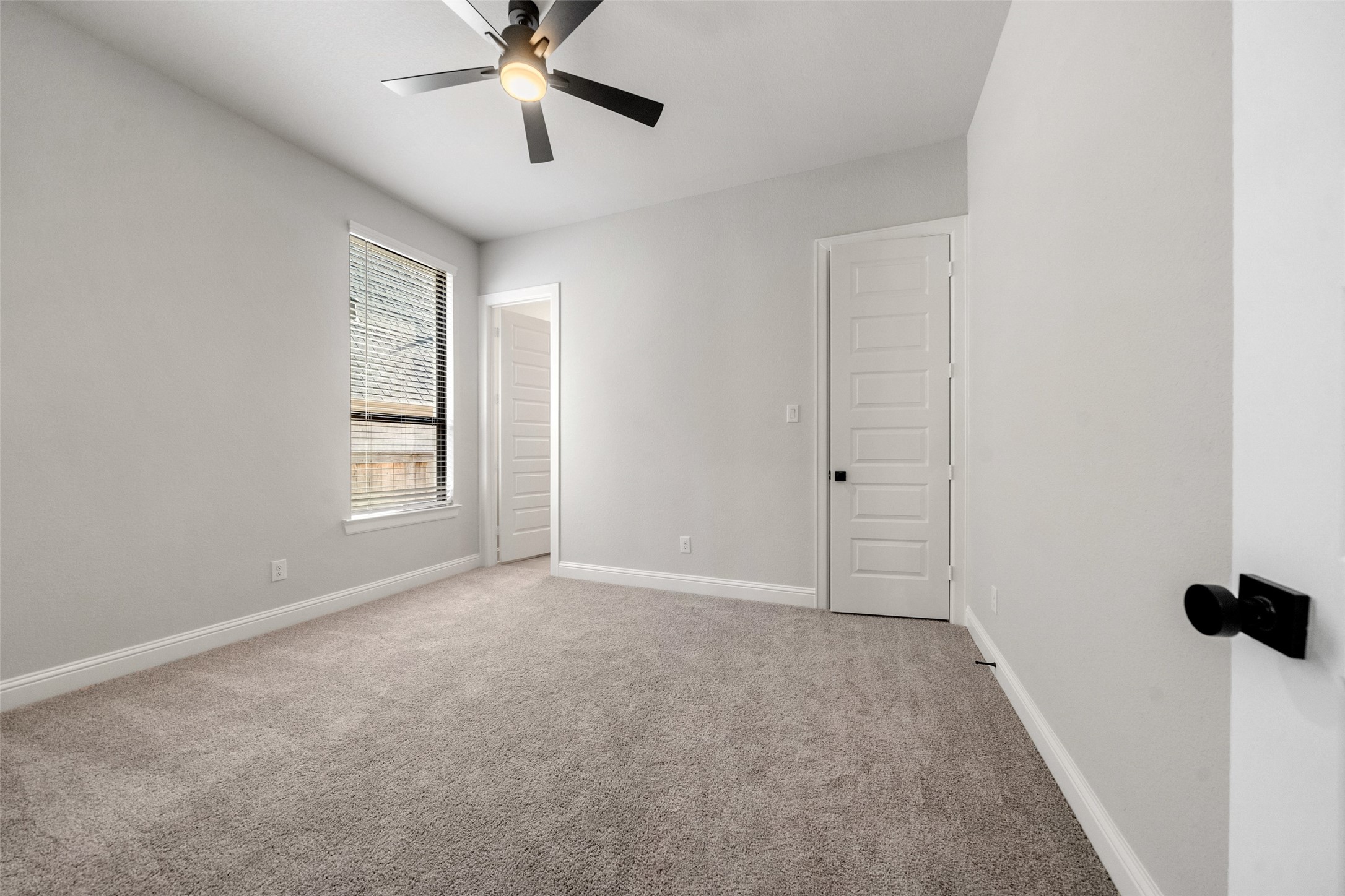 15464 Ringbill Way Magnolia, TX 77354 - Photo 28 of 37 a view of an empty room with a window
