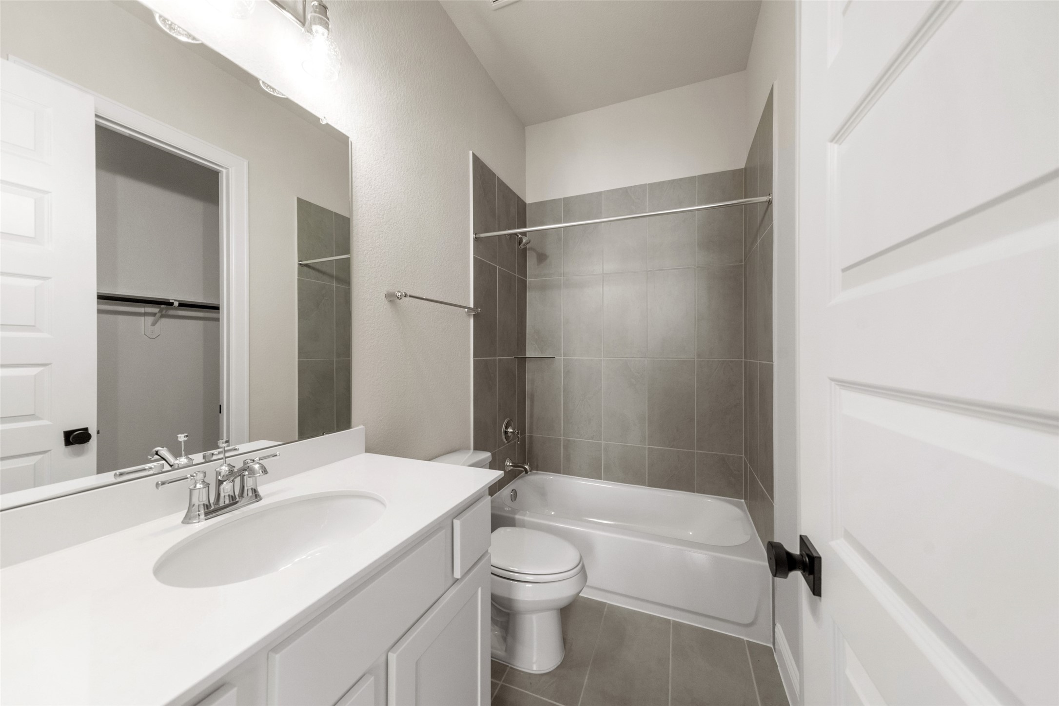 15464 Ringbill Way Magnolia, TX 77354 - Photo 30 of 37 a bathroom with a granite countertop sink toilet and shower
