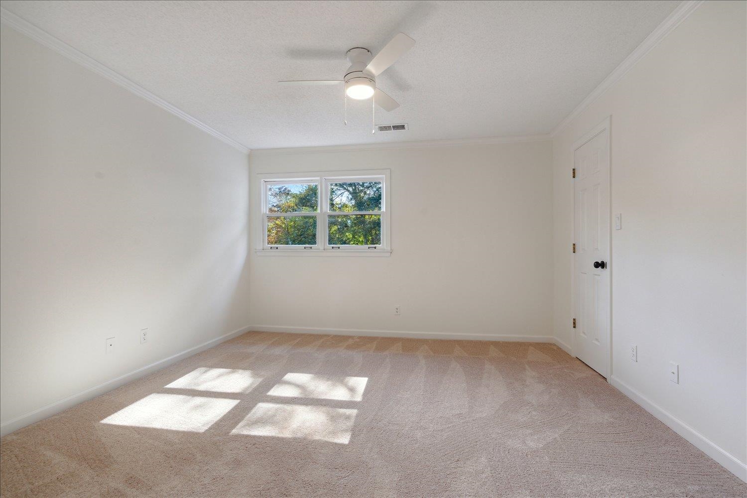 7215 Plantation Circle Germantown, TN 38138 - Photo 24 of 30 an empty room with windows and closet