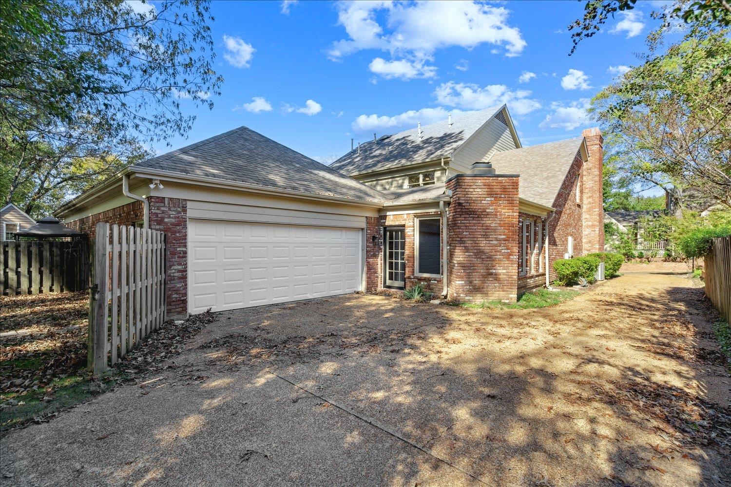 7215 Plantation Circle Germantown, TN 38138 - Photo 28 of 30 a view of a house with a yard