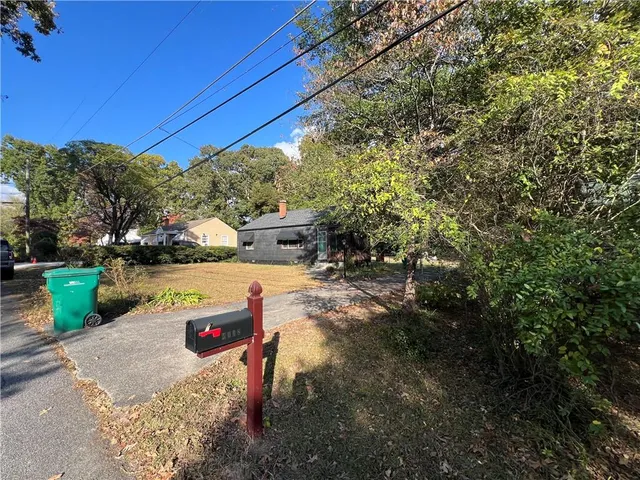 a view of yard with tree and outdoor