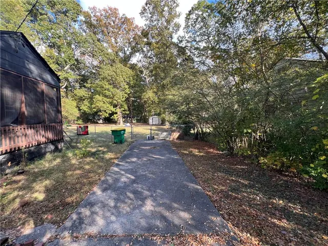 a view of backyard with green space