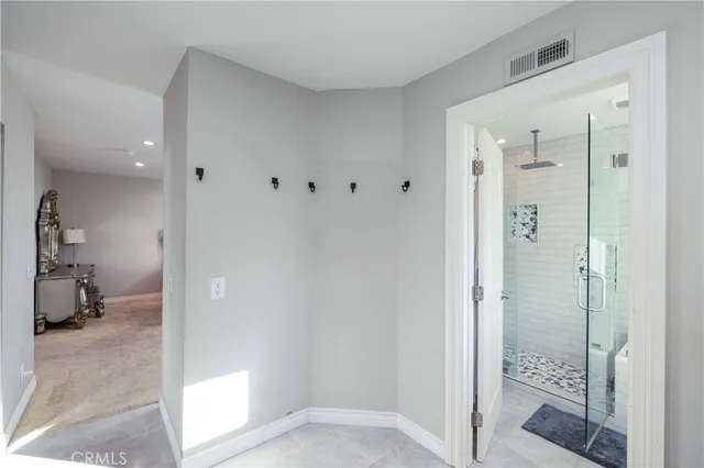 a bedroom with a bed and a table