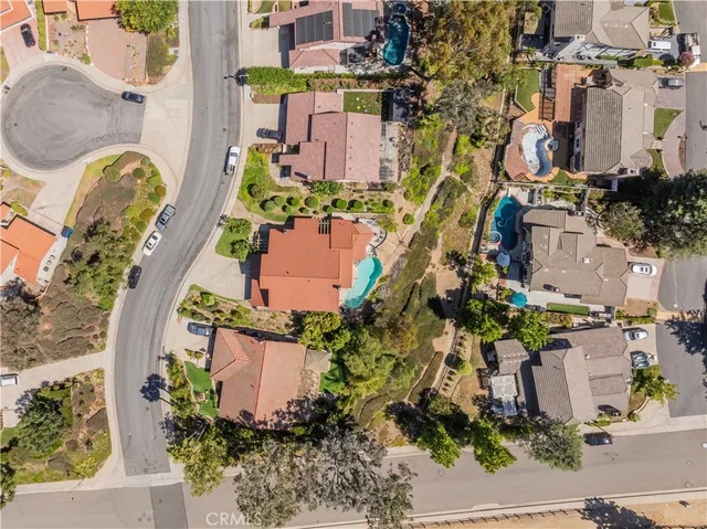 a vase of flowers sitting on a floor
