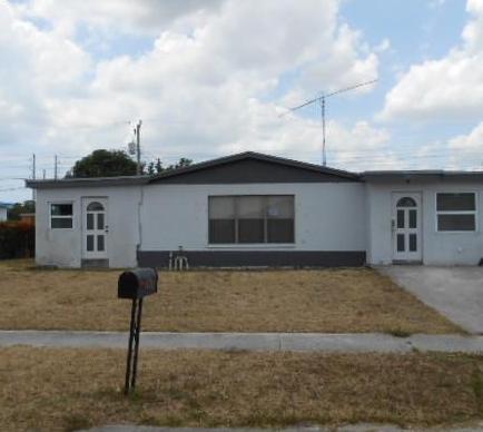 1341 West 2nd Street Riviera Beach, FL 33404 - Photo 1 of 8 Front