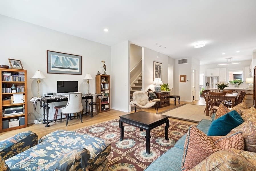 1648 South Prairie Avenue, Unit 2 Chicago, IL 60616 - Photo 9 of 19 a living room with furniture and a flat screen tv