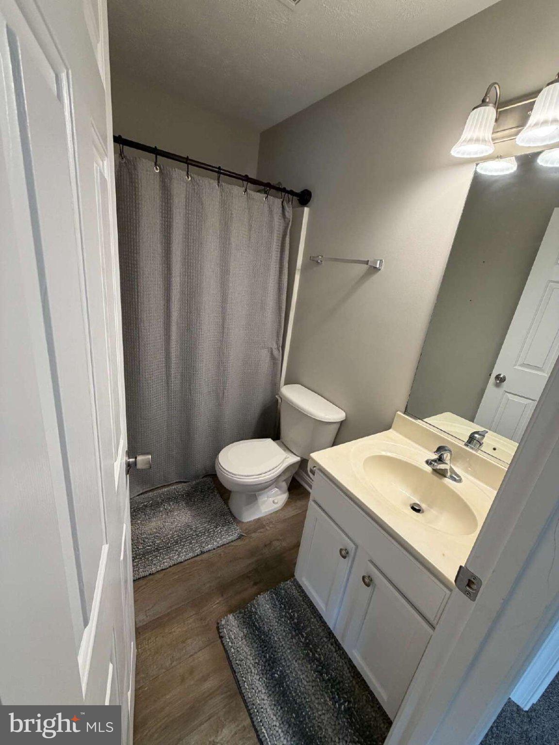 313 3rd Street Colonial Beach, VA 22443 - Photo 13 of 36 Modern bathroom with sleek finishes.