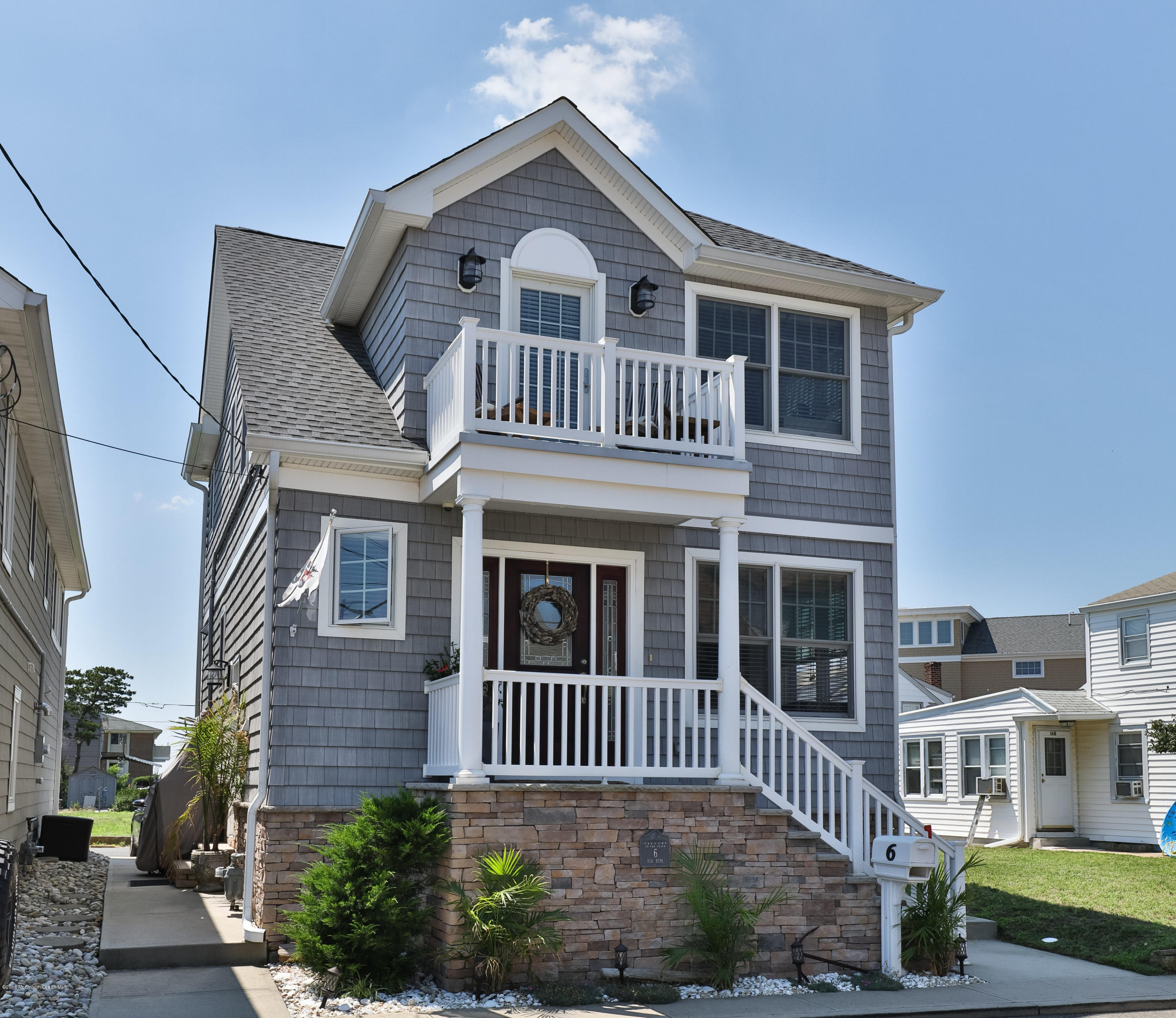 6 Via Ripa Sea Bright, NJ 07760 - Photo 1 of 25 a front view of a house with a yard