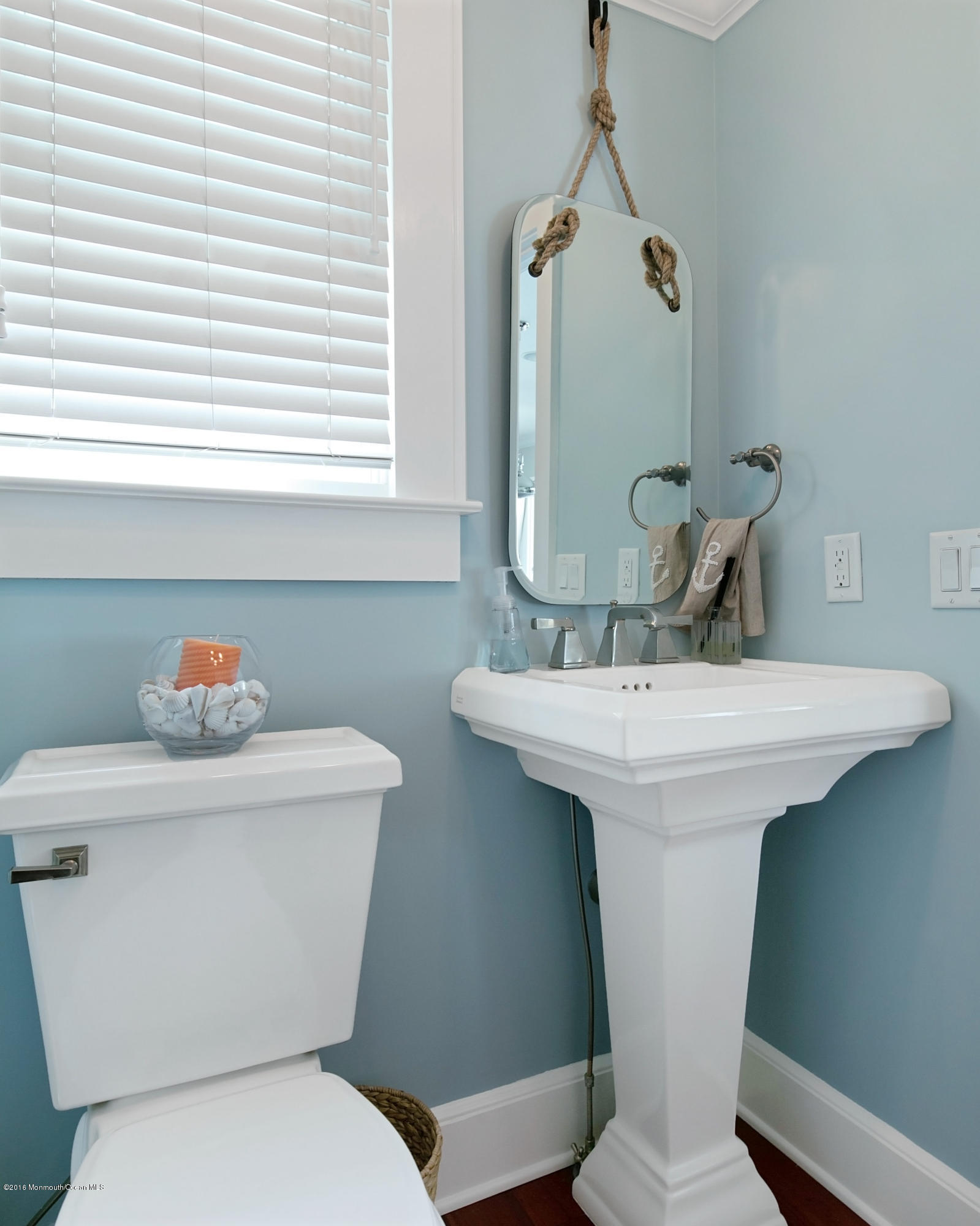 6 Via Ripa Sea Bright, NJ 07760 - Photo 12 of 25 a bathroom with a sink mirror toilet and window
