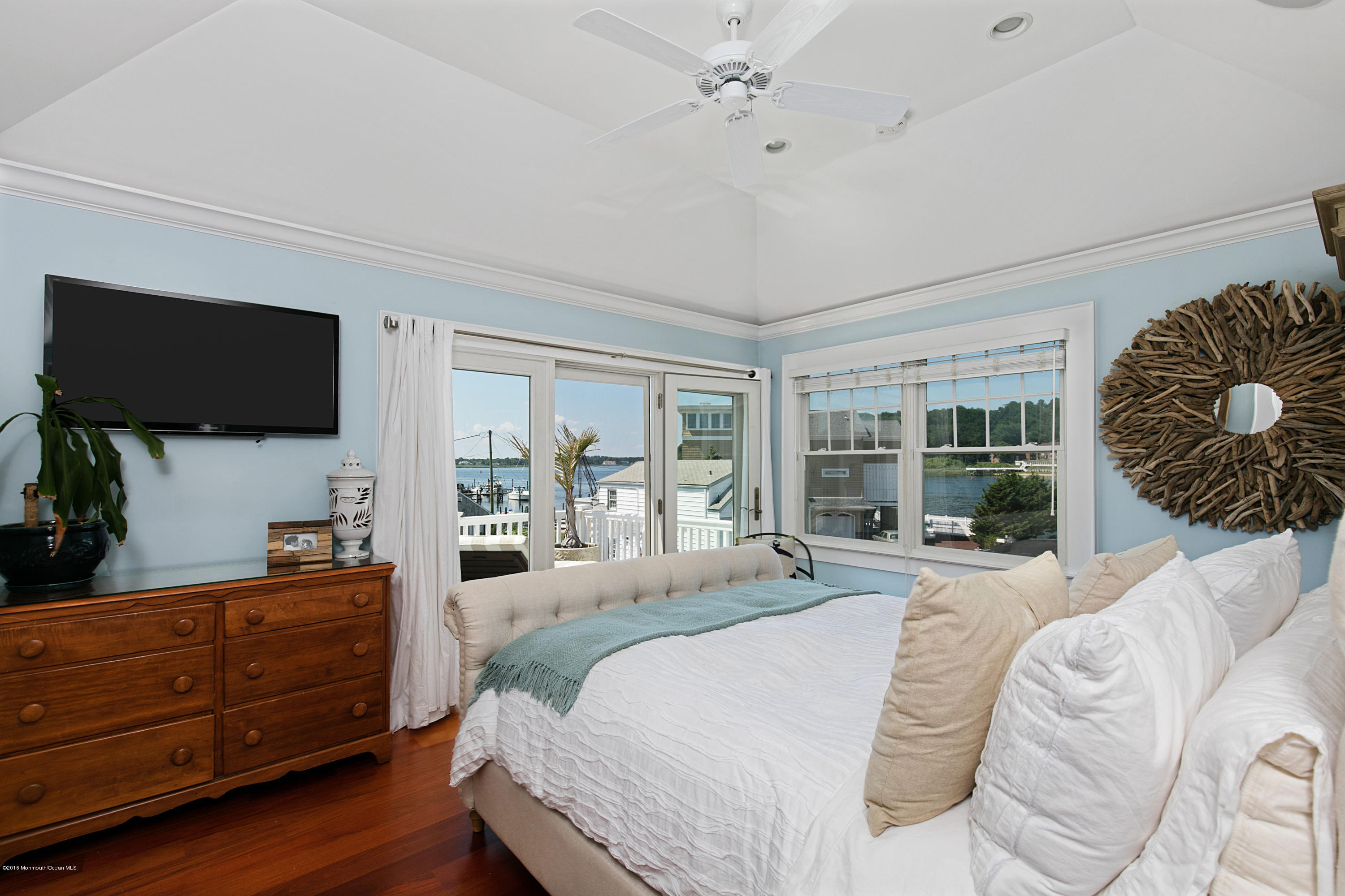 6 Via Ripa Sea Bright, NJ 07760 - Photo 14 of 25 a bedroom with a bed and flat screen tv