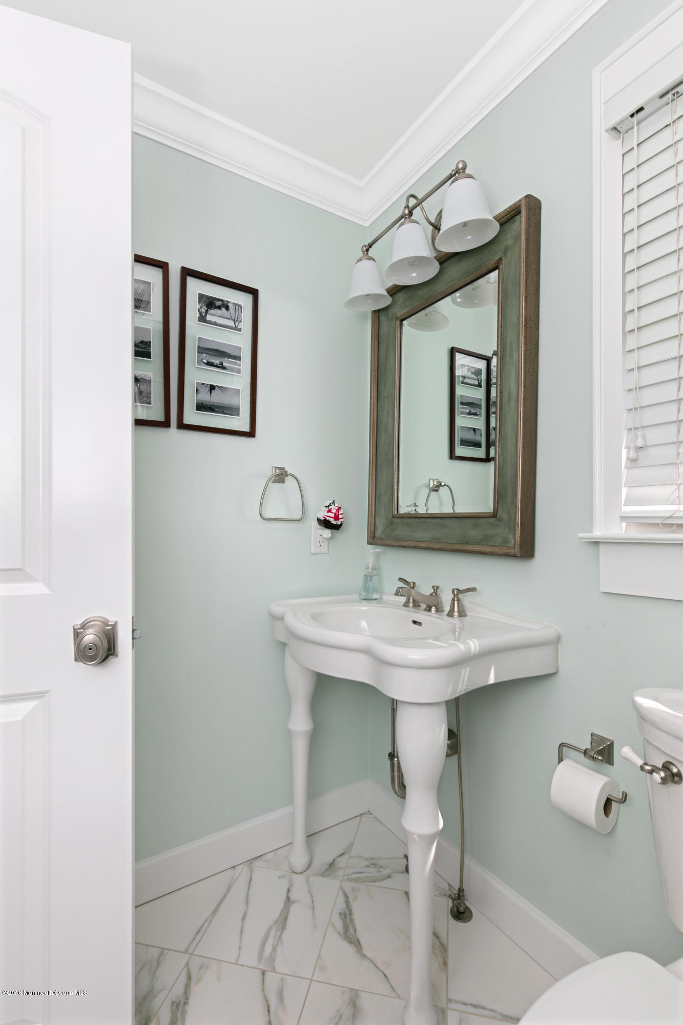 6 Via Ripa Sea Bright, NJ 07760 - Photo 20 of 25 a bathroom with a sink mirror and a toilet