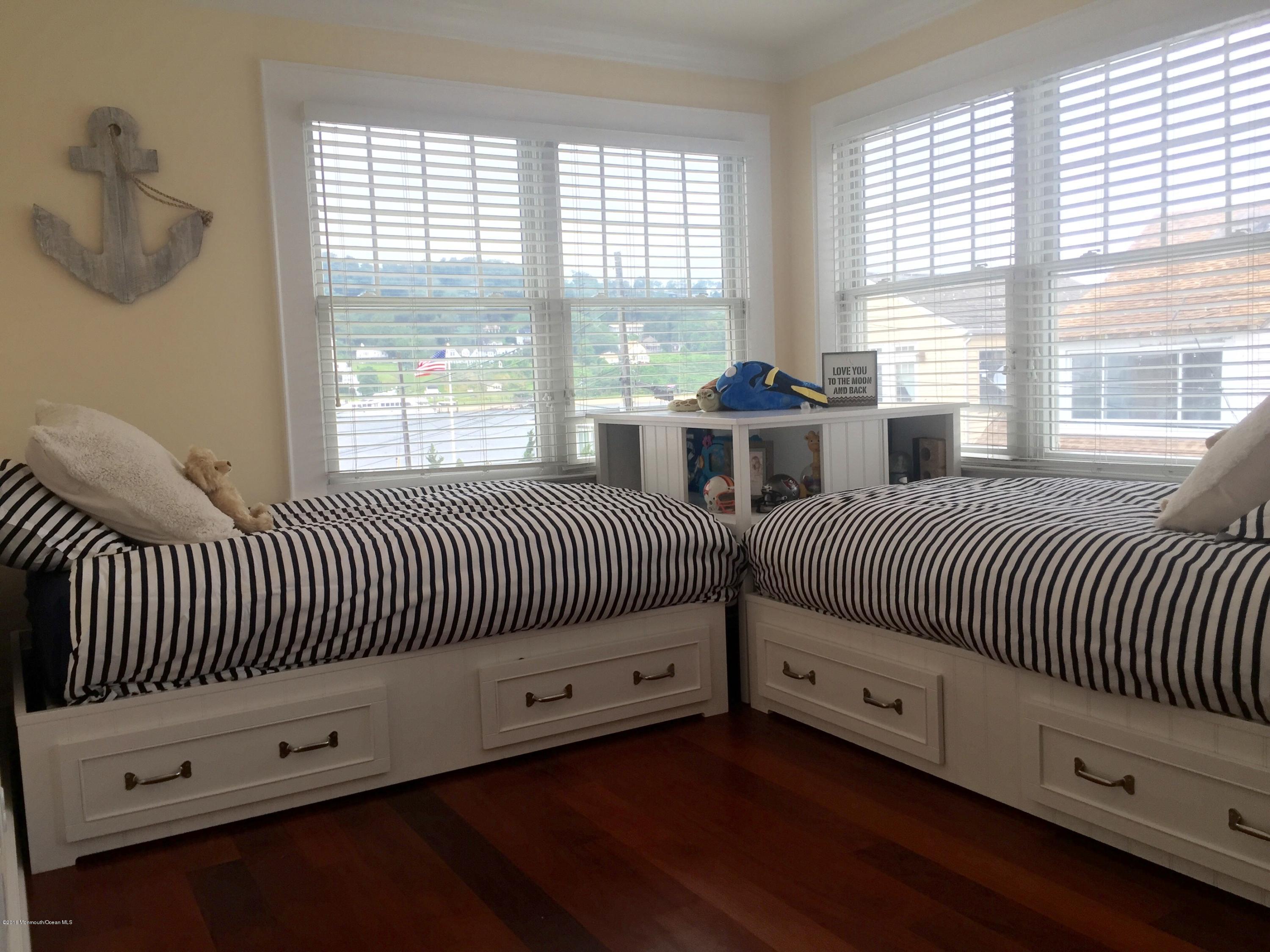 6 Via Ripa Sea Bright, NJ 07760 - Photo 21 of 25 a bedroom with two beds and a large window