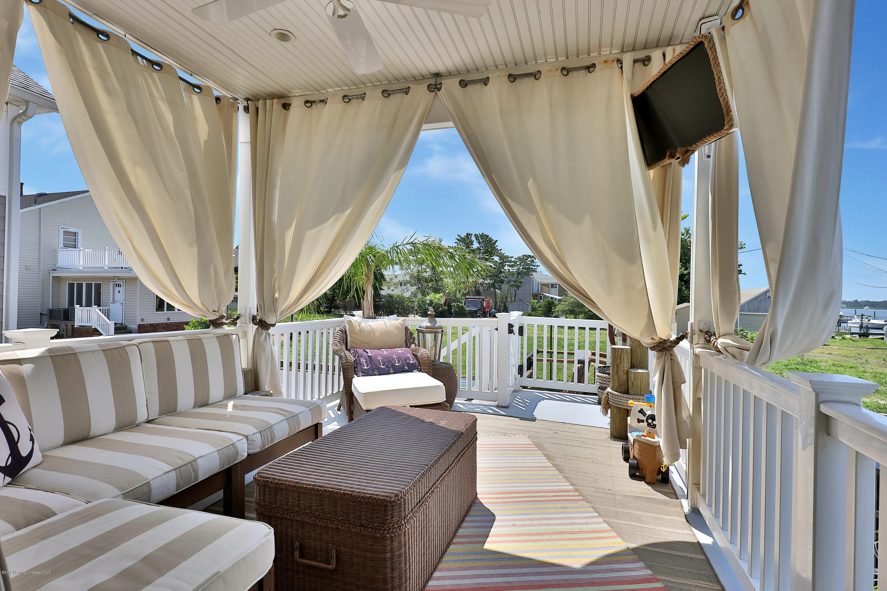 6 Via Ripa Sea Bright, NJ 07760 - Photo 4 of 25 a living room with furniture and a fireplace