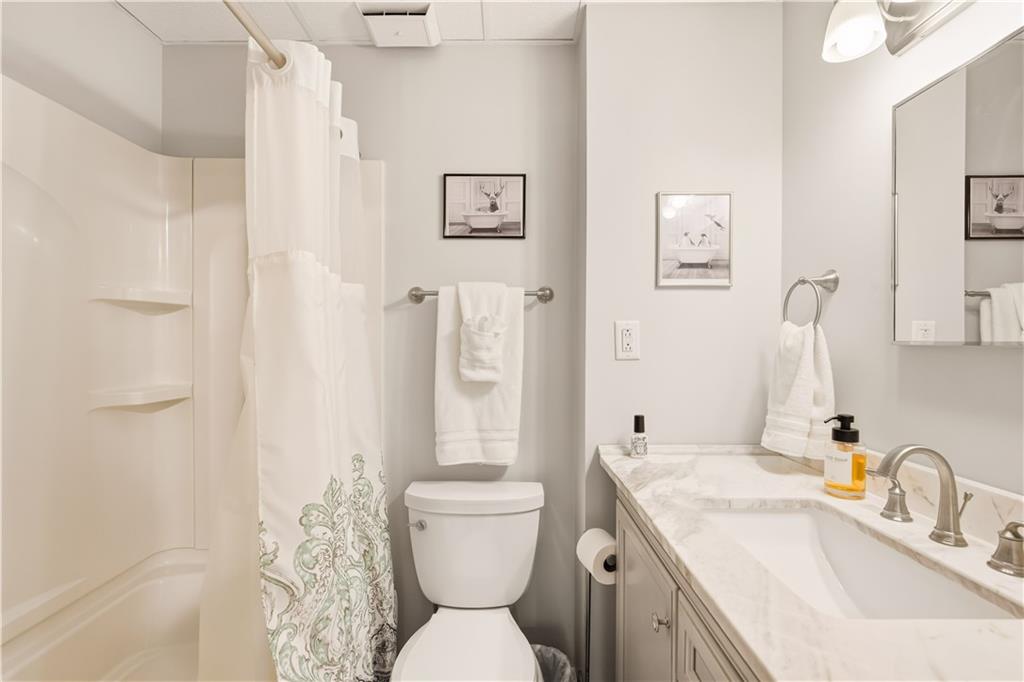 186 Lake Rd Lane Rockwood, PA 15557 - Photo 22 of 50 a bathroom with a sink toilet and shower