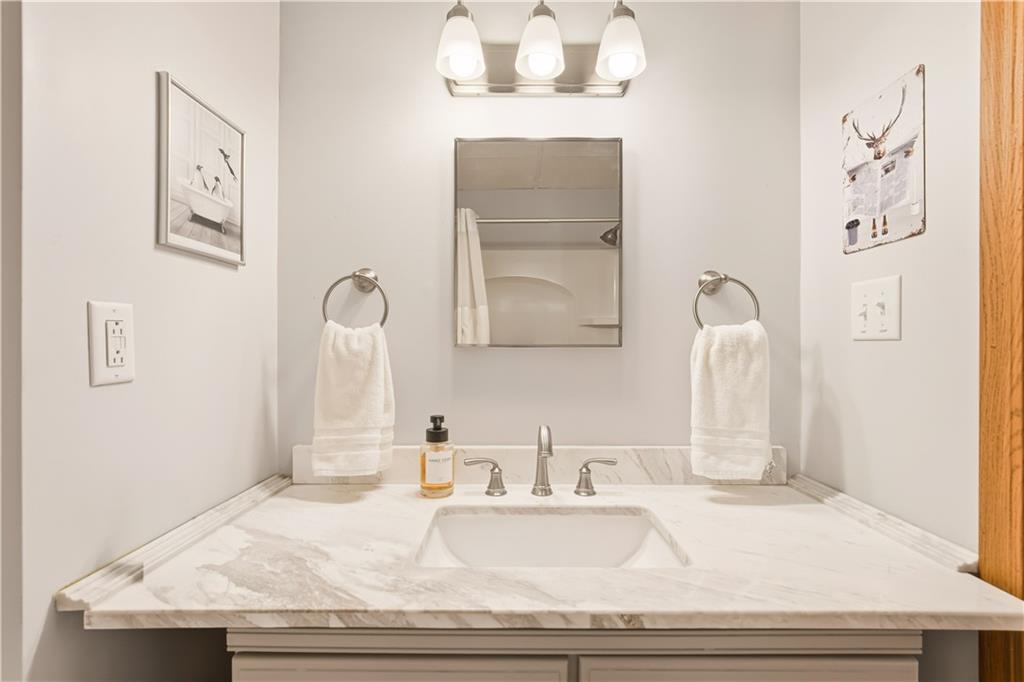 186 Lake Rd Lane Rockwood, PA 15557 - Photo 23 of 50 a bathroom with a sink and a mirror