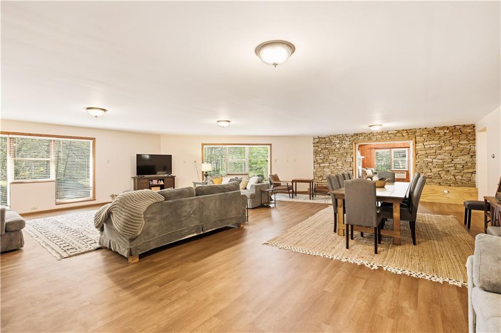 186 Lake Rd Lane Rockwood, PA 15557 - Photo 28 of 50 a living room with furniture and a flat screen tv