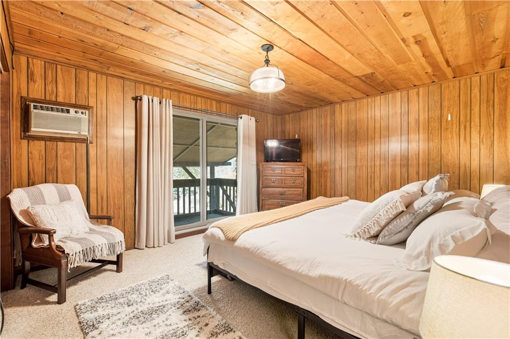 186 Lake Rd Lane Rockwood, PA 15557 - Photo 39 of 50 a bedroom with a bed and a window