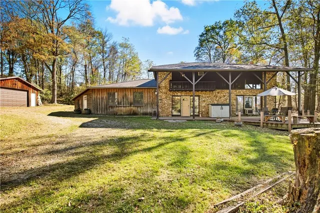 a view of a house with a swimming pool