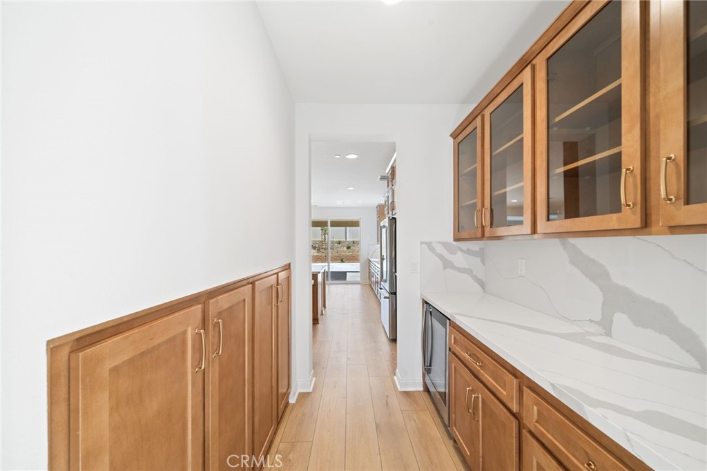 39565 Caladium Drive Temecula, CA 92591 - Photo 10 of 66 a view of a kitchen from the hallway