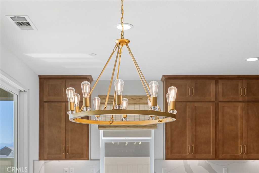 39565 Caladium Drive Temecula, CA 92591 - Photo 13 of 66 Upgraded Chandelier in Dining Nook