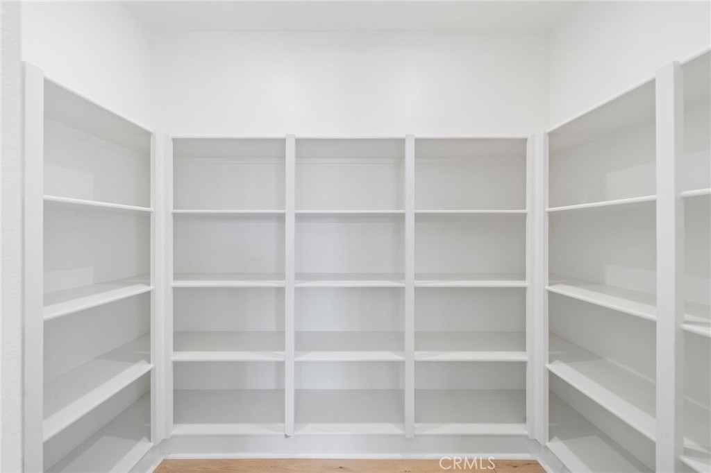 39565 Caladium Drive Temecula, CA 92591 - Photo 20 of 66 a view of an empty room with empty racks