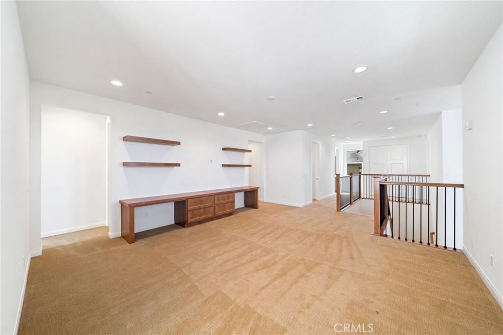 39565 Caladium Drive Temecula, CA 92591 - Photo 31 of 66 a view of a big room with closet and windows