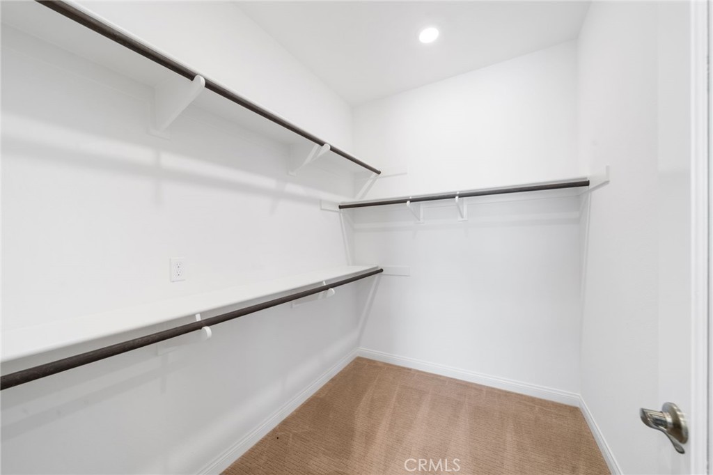 39565 Caladium Drive Temecula, CA 92591 - Photo 45 of 66 a view of a room with racks on the wall