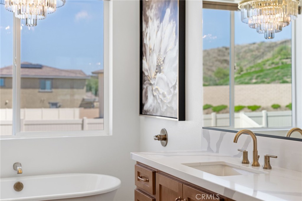39565 Caladium Drive Temecula, CA 92591 - Photo 51 of 66 a bathroom with a sink and a window