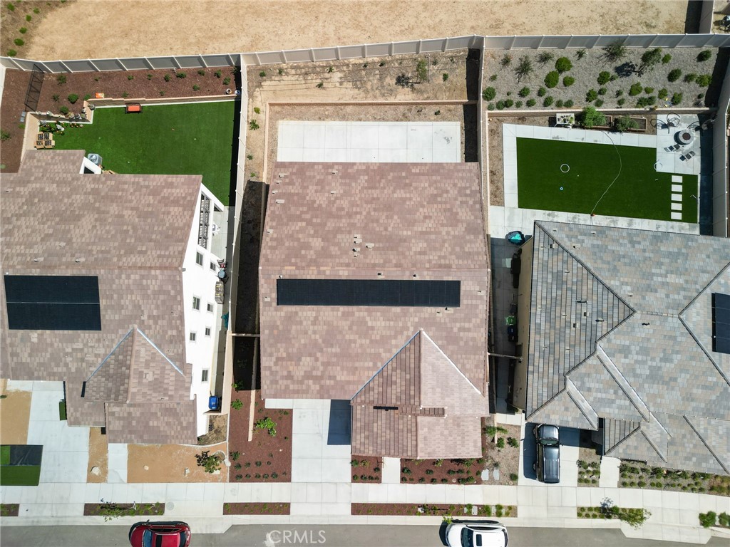 39565 Caladium Drive Temecula, CA 92591 - Photo 59 of 66 an aerial view of a house with a yard and lake view