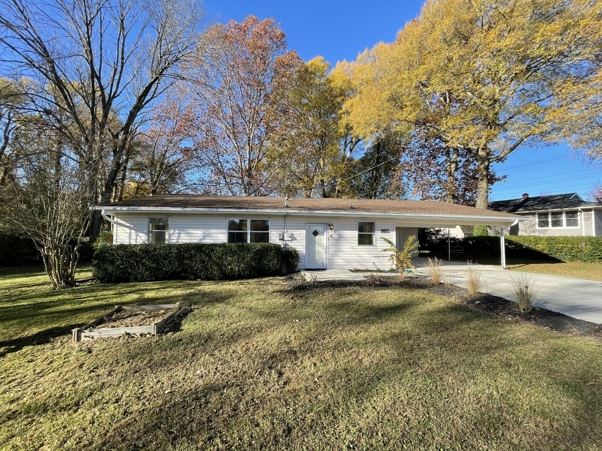 102 Goucher Circle Oak Ridge, TN 37830 - Photo 1 of 37 a front view of a house with a yard