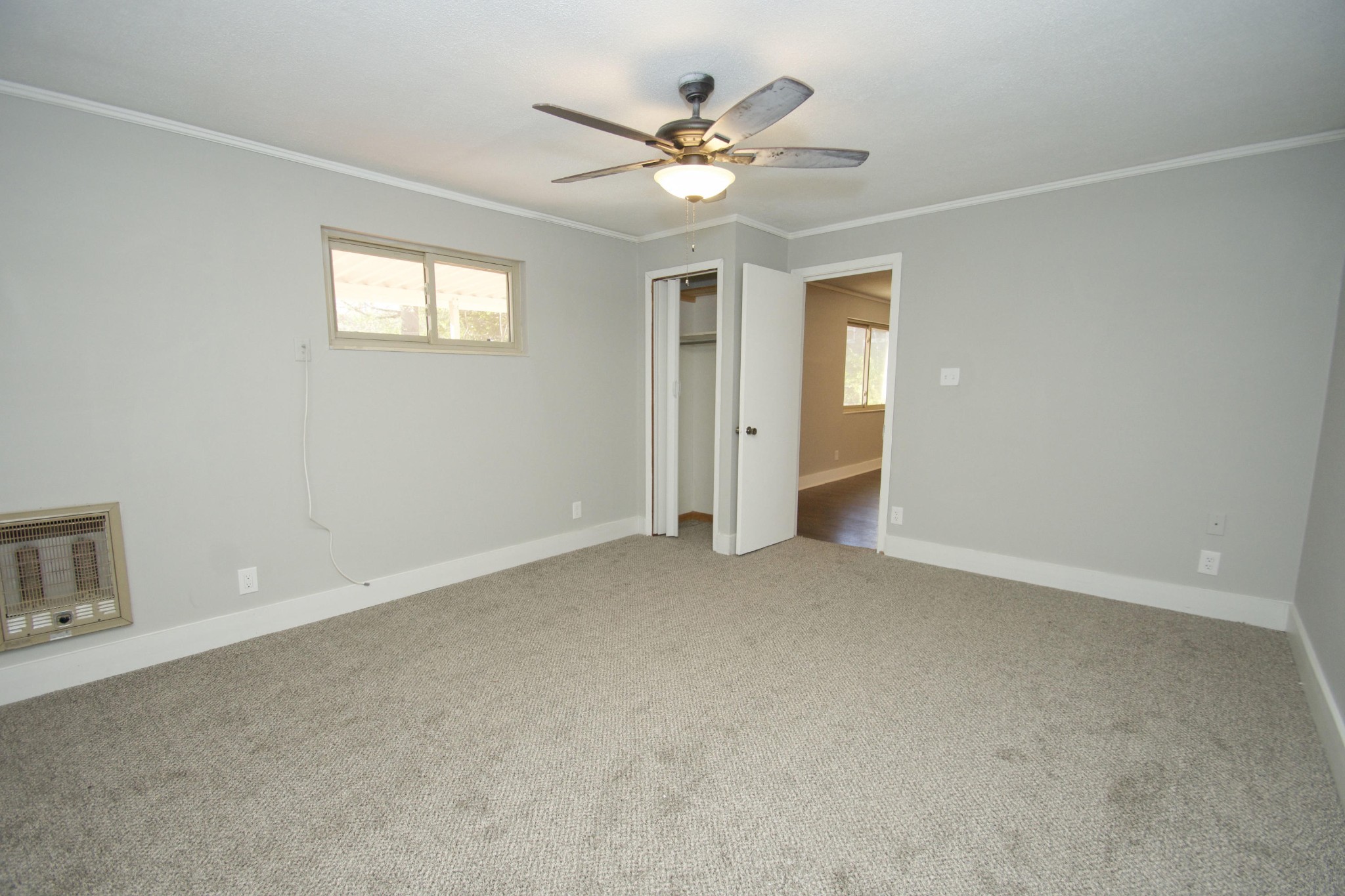 102 Goucher Circle Oak Ridge, TN 37830 - Photo 11 of 37 a view of an empty room with a ceiling fan