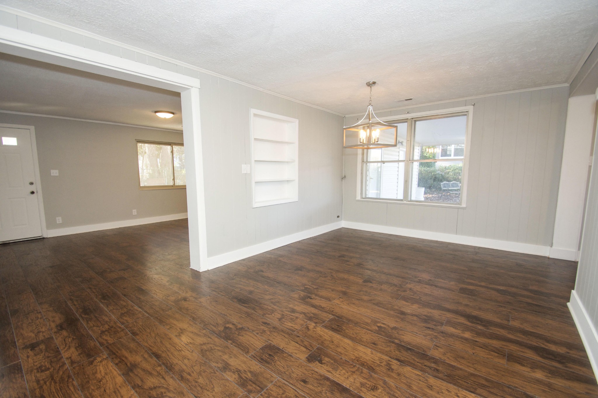 102 Goucher Circle Oak Ridge, TN 37830 - Photo 15 of 37 an empty room with wooden floor and windows