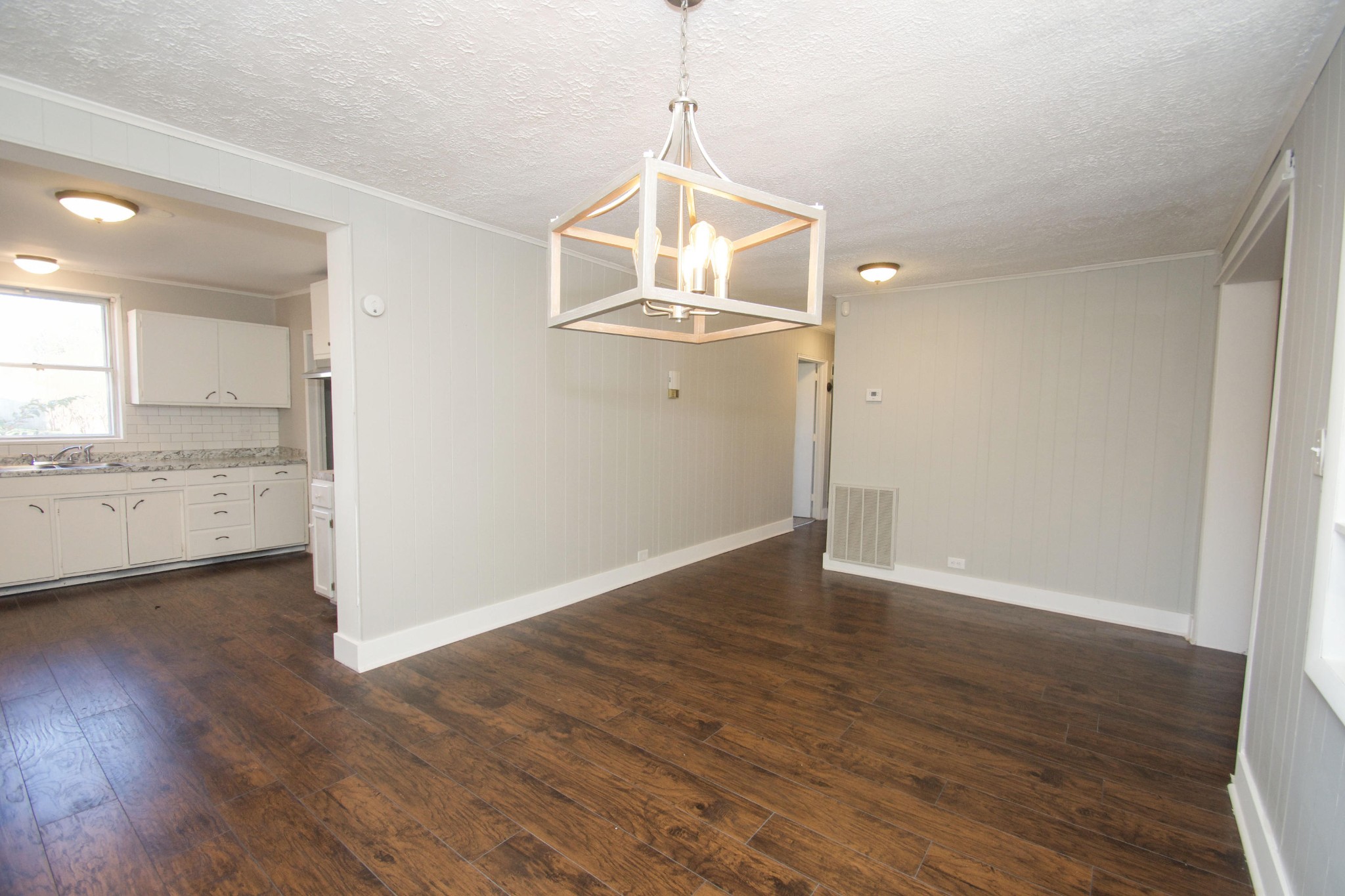 102 Goucher Circle Oak Ridge, TN 37830 - Photo 16 of 37 a view of a kitchen with wooden floor and windows