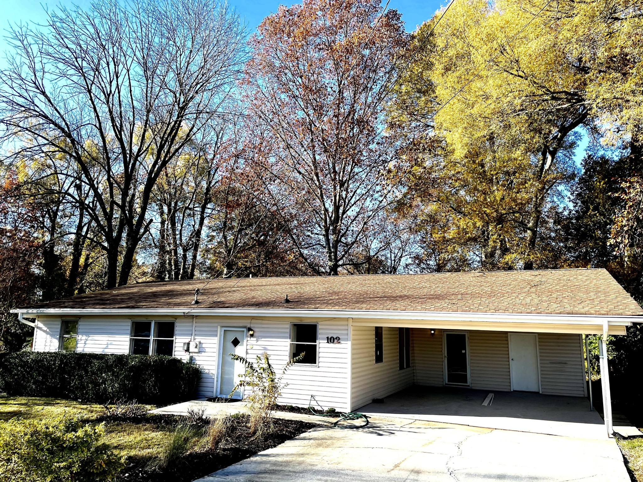 102 Goucher Circle Oak Ridge, TN 37830 - Photo 2 of 37 a front view of a house with a yard