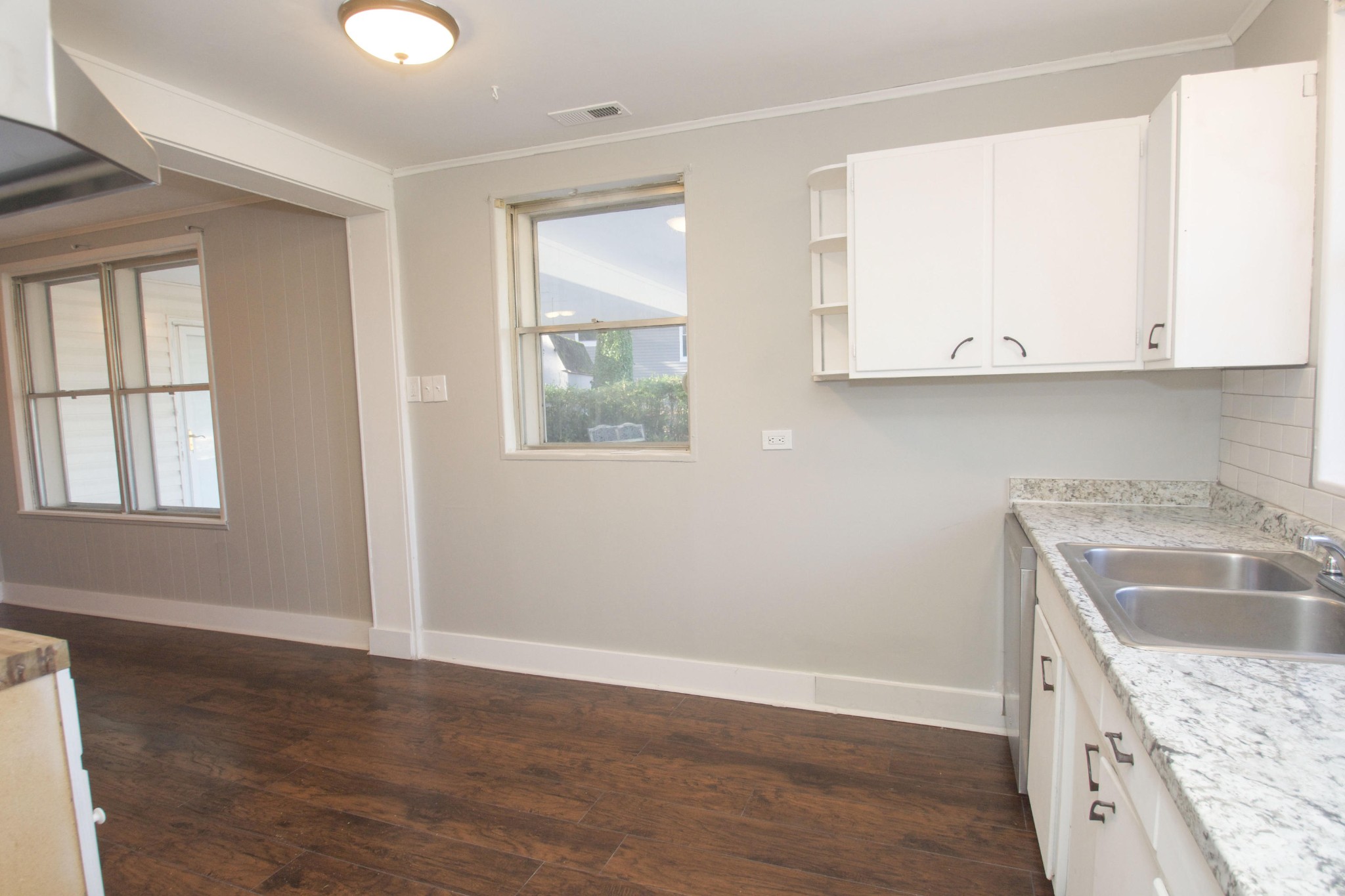 102 Goucher Circle Oak Ridge, TN 37830 - Photo 22 of 37 an empty room with wooden floor and window