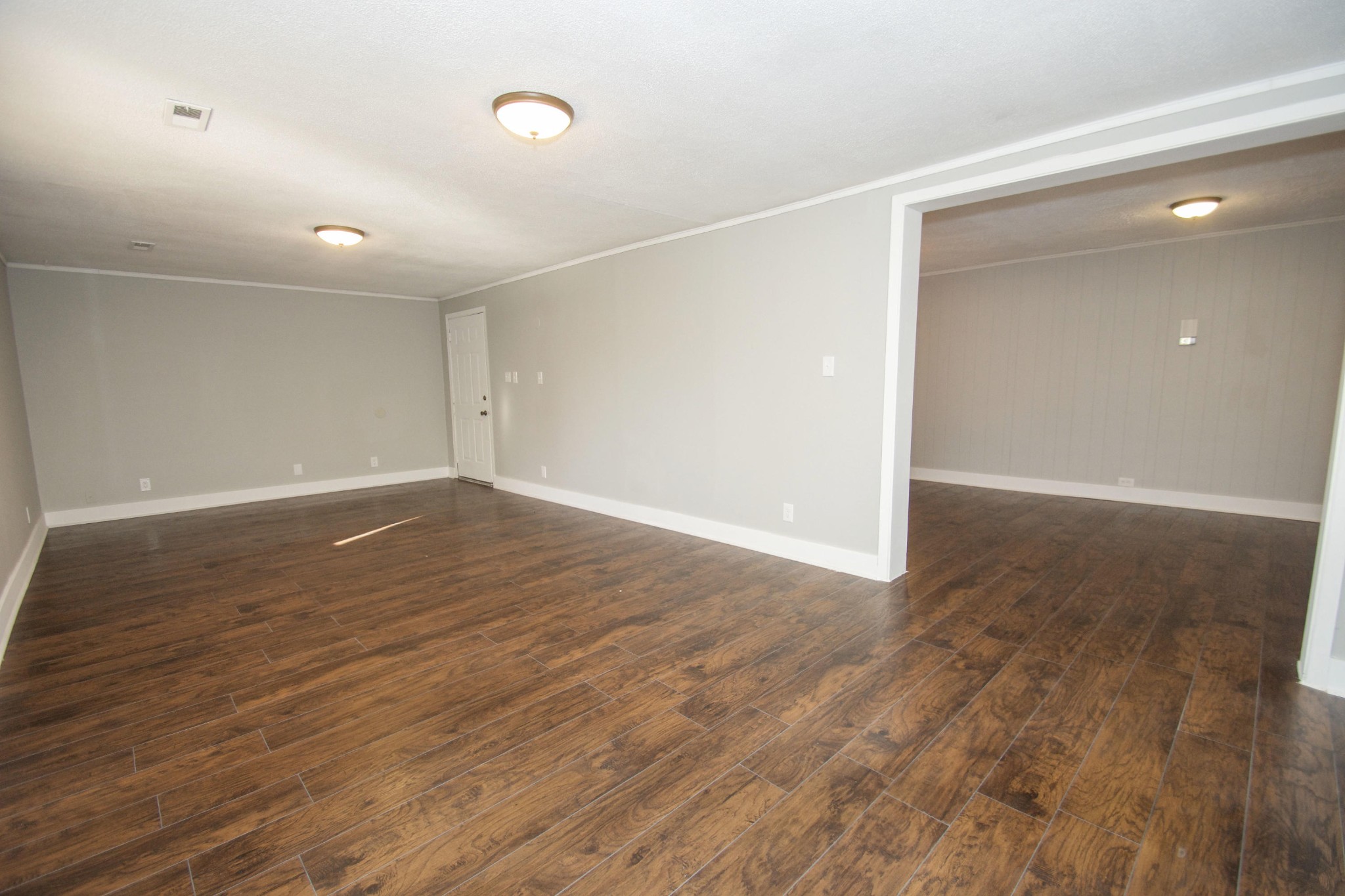 102 Goucher Circle Oak Ridge, TN 37830 - Photo 4 of 37 wooden floor in an empty room with wooden floor