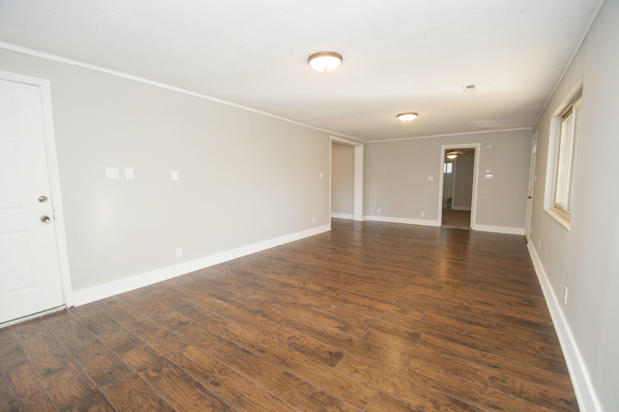102 Goucher Circle Oak Ridge, TN 37830 - Photo 7 of 37 a view of an empty room with wooden floor