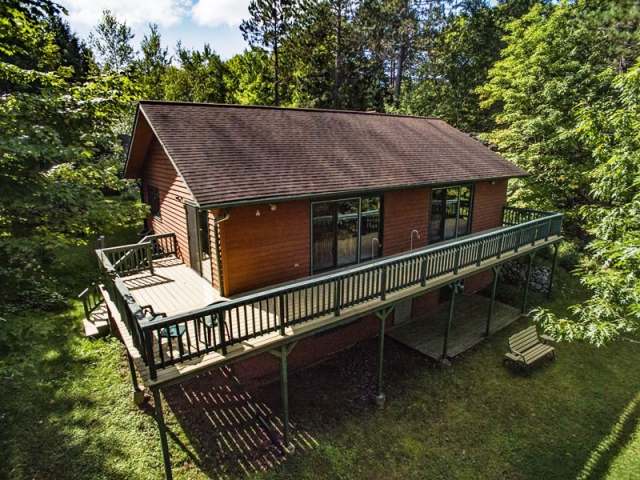 14014 Adelaide Road Presque Isle, WI 54557 - Photo 1 of 20 Gallery Image 1