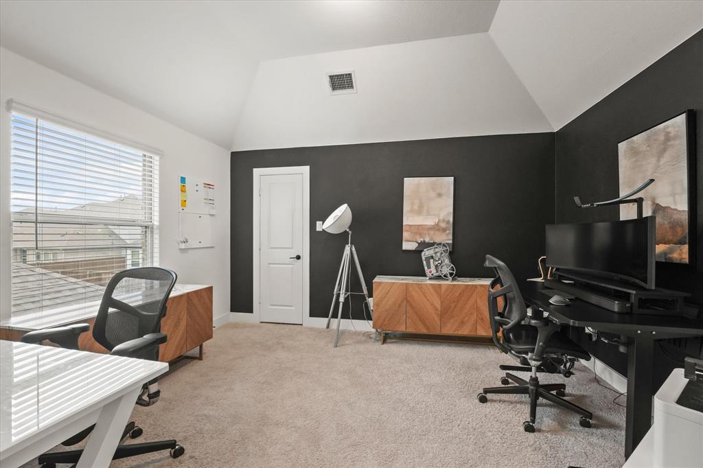 1714 Highwood Road Forney, TX 75126 - Photo 21 of 30 Vaulted ceiling room with carpet flooring and a window featuring horizontal blinds