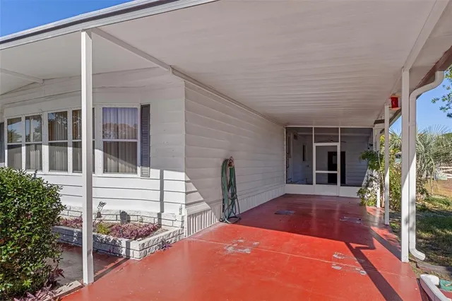 a backyard of a house with seating space