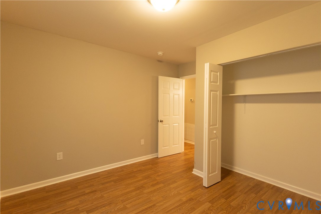398 Blinkys Road New Canton, VA 23123 - Photo 12 of 21 a view of a room with wooden floor