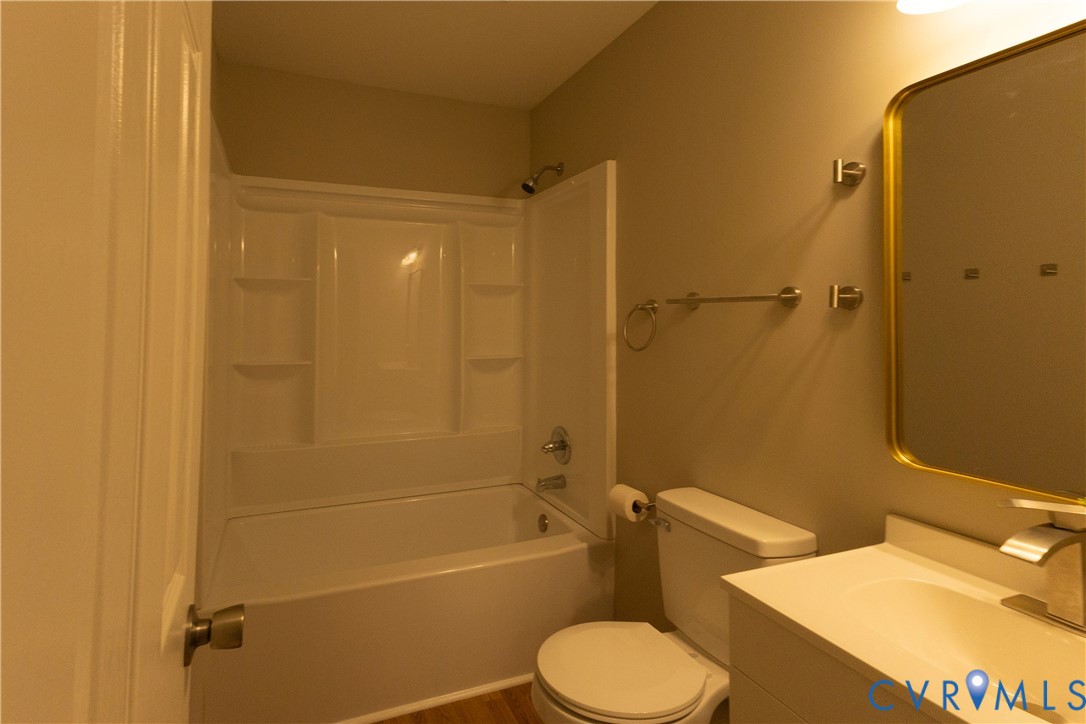 398 Blinkys Road New Canton, VA 23123 - Photo 18 of 21 a bathroom with a sink toilet and shower